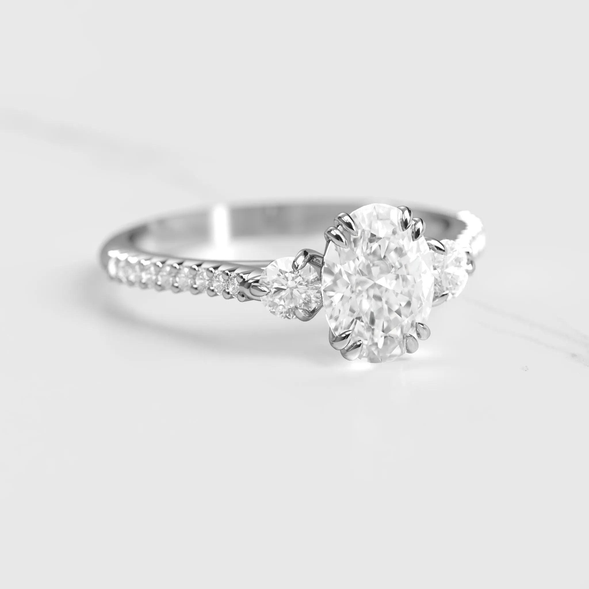 Oval Half Pave Diamond Ring With Accent Stones