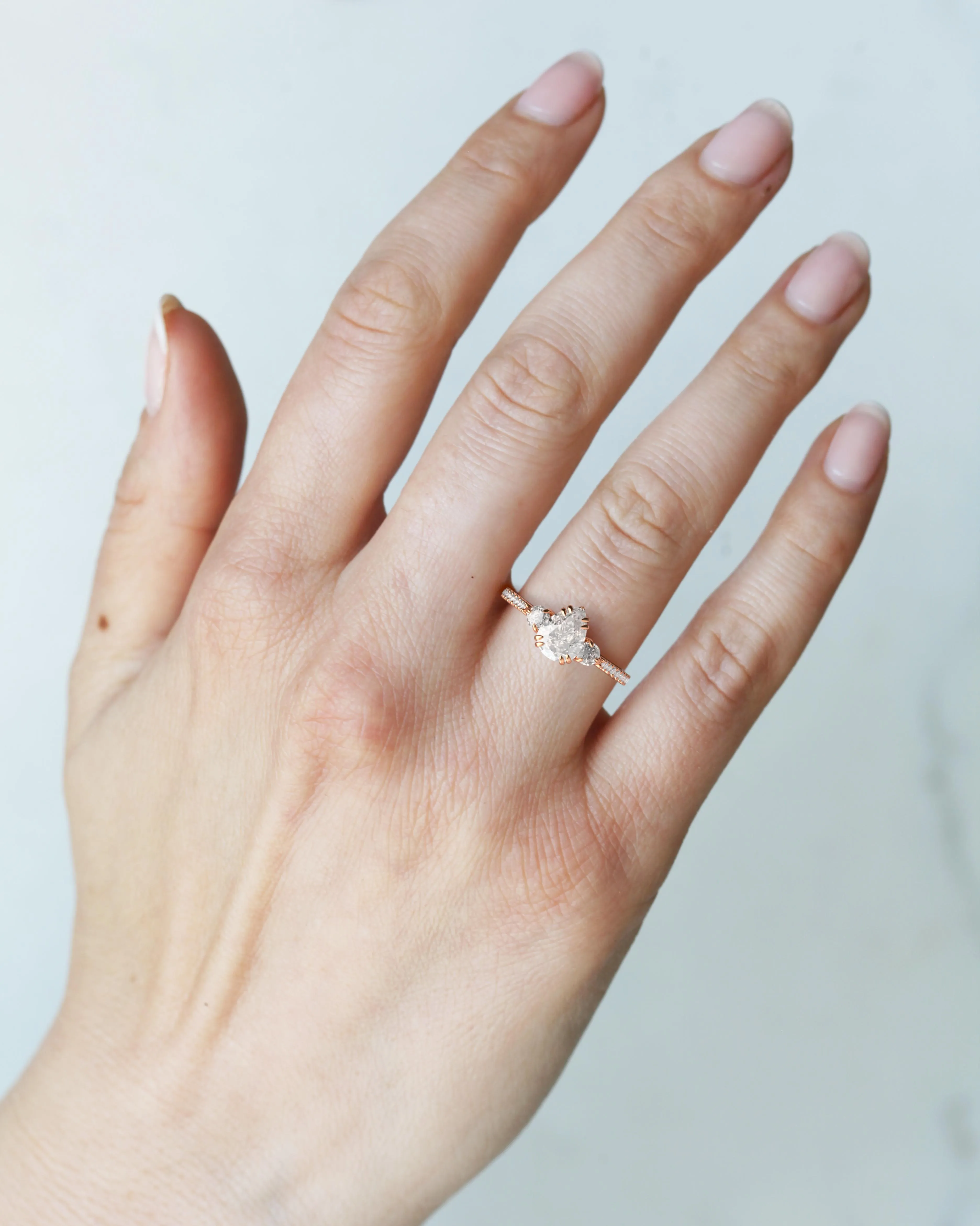 Pear Half Pave Diamond Ring With Accent Stones