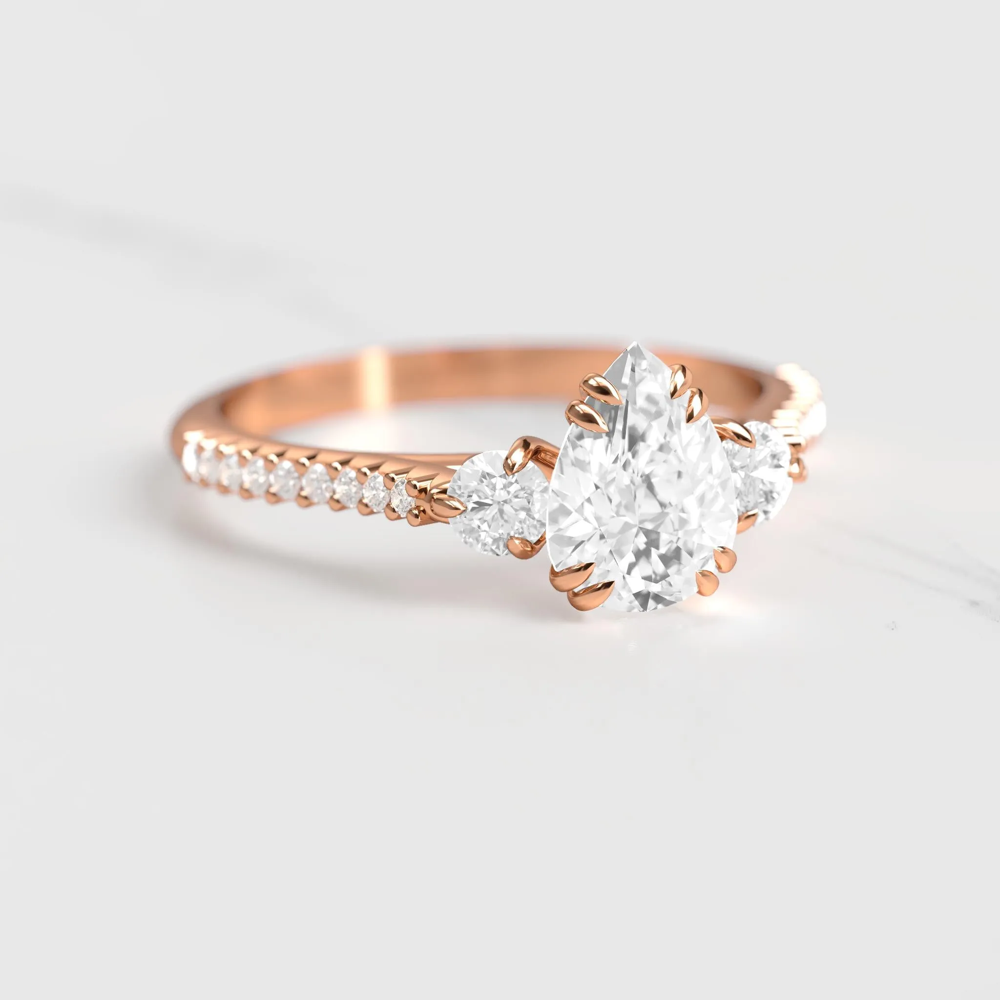 Pear Half Pave Diamond Ring With Accent Stones