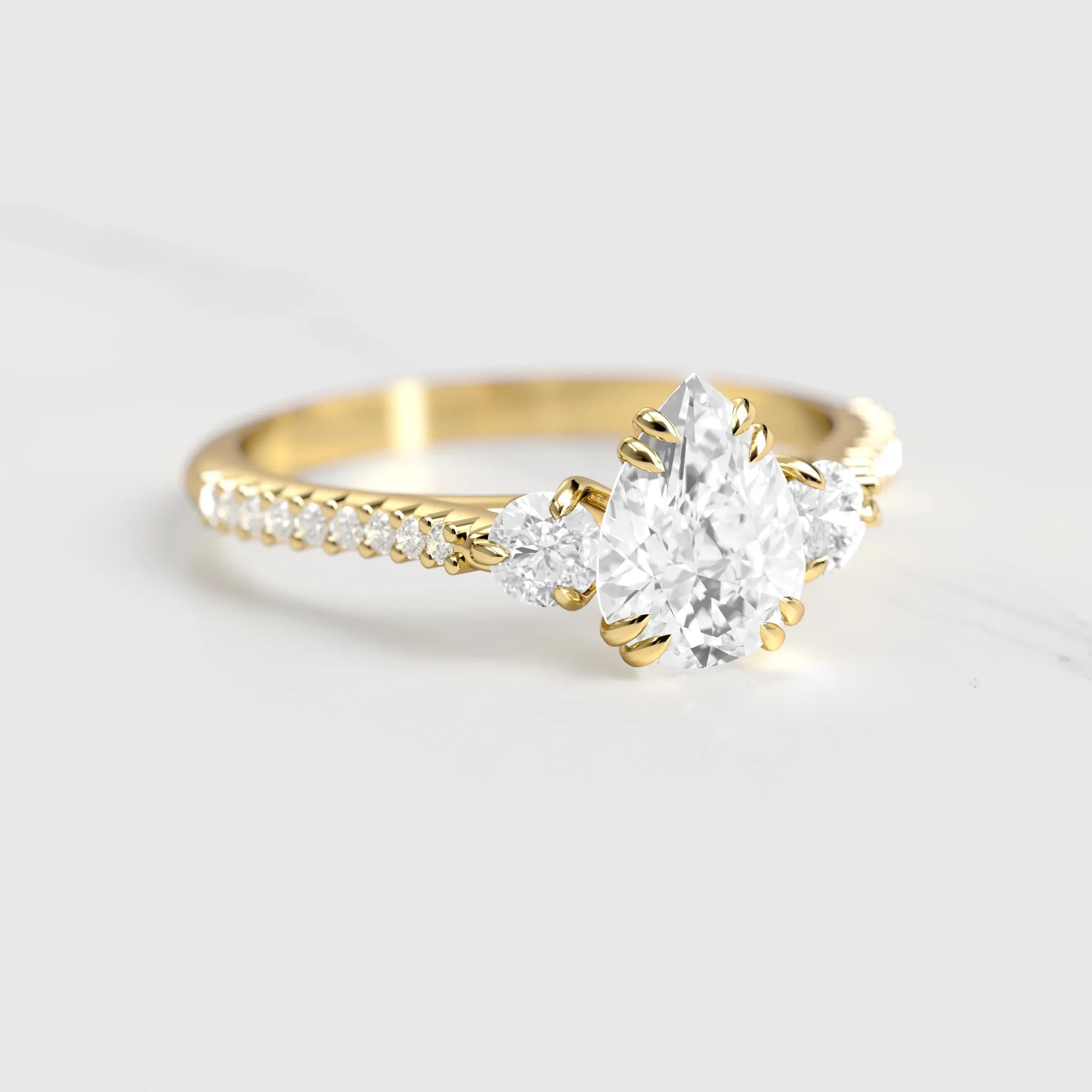 Pear Half Pave Diamond Ring With Accent Stones