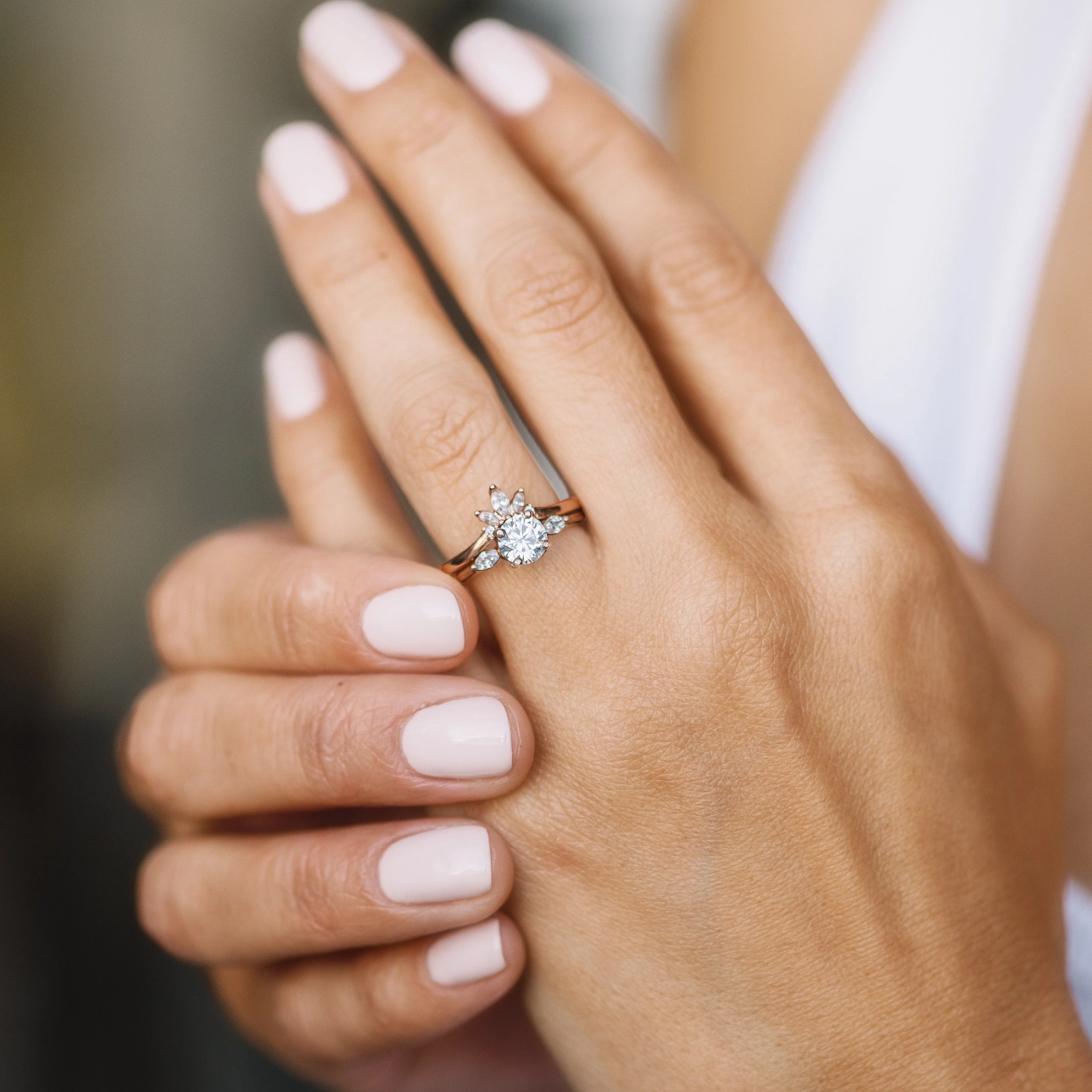 Solitaire and Pear Side Diamond Engagement Ring