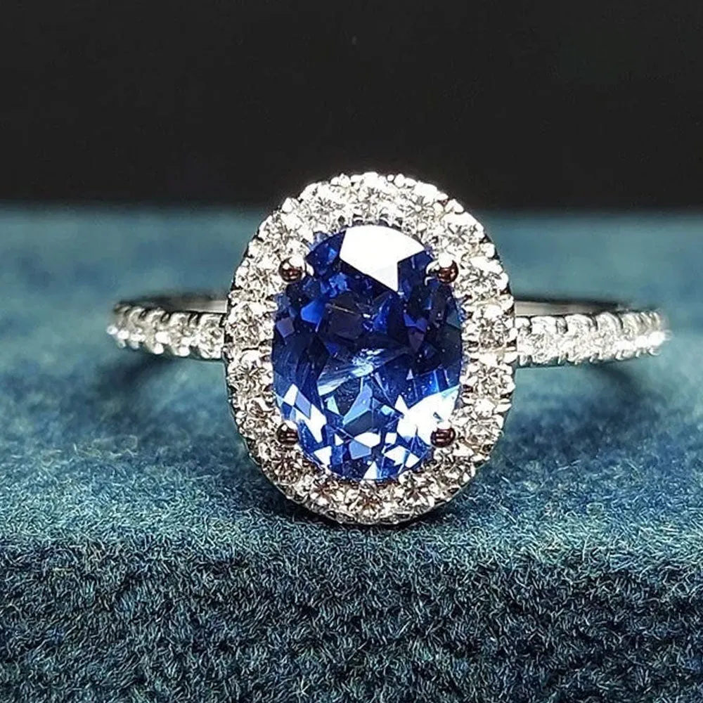 Vintage Blue Oval Cut Engagement Ring In Sterling Silver